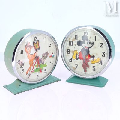 two clocks that are sitting on top of each other
