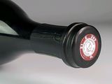 a close up of a bottle of wine on a table
