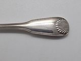 a spoon that is sitting on a table