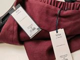 a picture of a pair of pants with a price tag on them