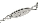 an image of a close up of a chain with a tag on it