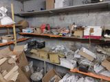 many boxes and boxes on the shelves in the room