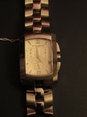 60.58 - Montre Baume & Mercier EN Metal 300 - 350 Euro