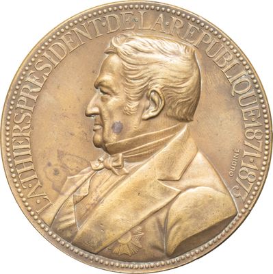 l'image d'une pièce d'or sur laquelle figure le portrait d'un homme