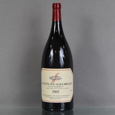 a bottle of wine that is sitting on a table