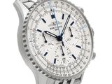 the watch is white and blue with a blue second hand