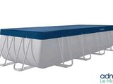 an image of a rectangular swimming pool with a blue cover
