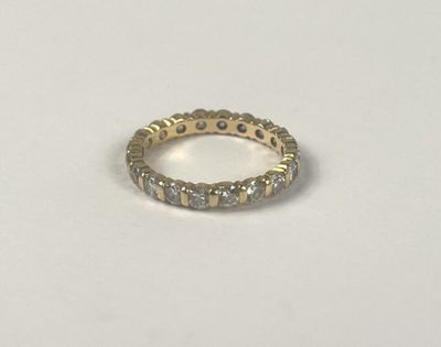 an image of a diamond ring on a white surface