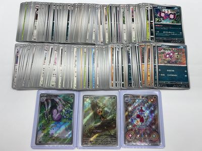 a close up of a bunch of cards sitting on top of a table