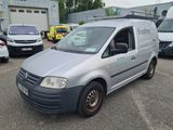 a silver van that is parked in a parking lot