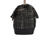 a black and white backpack with a black handle