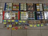 a lot of cards and a lot of other items on the floor