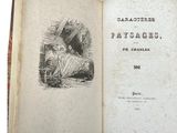an open book with a drawing of a man and a woman in a garden