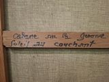 a wooden sign with writing on it on a wall
