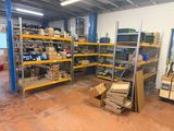 a room filled with lots of boxes and shelves