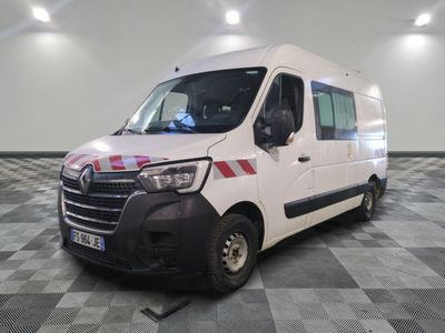 a picture of a white van parked in a large room