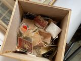 a box full of stamps sitting on top of a table
