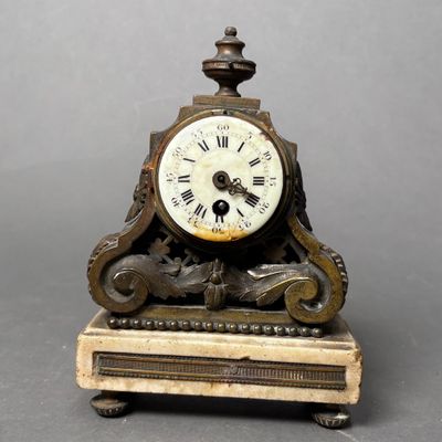 a clock that is sitting on top of a table