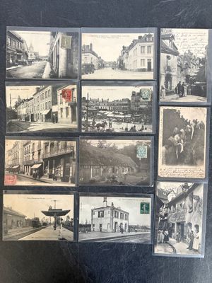 a black and white photo of a bunch of old postcards
