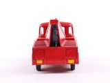 a red toy truck that is sitting on a white surface
