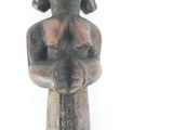 statue of a woman holding a baby in her arms