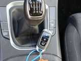 a picture of a car ' s gear box with a sticker attached to it