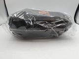 a bag of food wrapped in plastic sitting on a table
