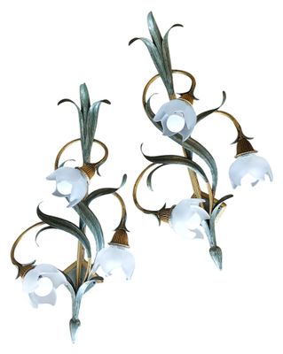 pair of brass and glass sconces with flowers and leaves