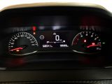a close up of a car dashboard with a speedometer and gauges