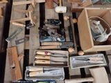 many different types of woodworking tools on a table