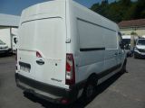 a white van that is parked in a parking lot