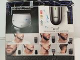 a box with a picture of a man ' s hair and beard trimmer in it