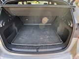 a trunk of a car with the trunk open