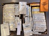 a box full of cassettes that are sitting on a table