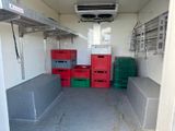 a small room with a lot of boxes in it