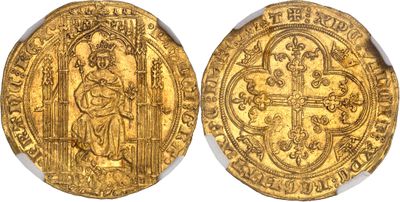 a gold coin with an image of a man holding a cross