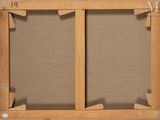 an old picture of a picture frame with a piece of fabric on it