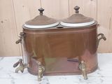 two brown pots sitting on top of a marble counter top