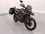 a motorcycle that is parked in a white room
