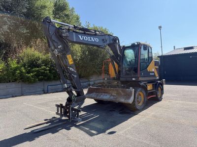 the back end of a volvo construction vehicle parked in a parking lot