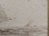 a close up of a piece of paper with a ruler on it