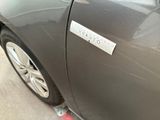 a close up of a car with a sticker on it