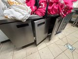 a bunch of bags that are on top of a counter