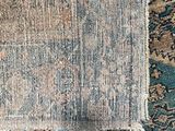 a close up of a piece of carpet that has been torn off