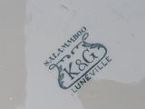 a close up of a plate with a bird on it