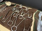 a lot of surgical tools sitting on a table