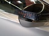 a sticker that says vauto on the side mirror of a car
