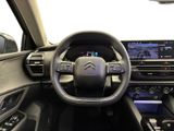 the interior of a car with a steering wheel, dashboard, and dash board