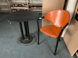 two chairs and a table in a room