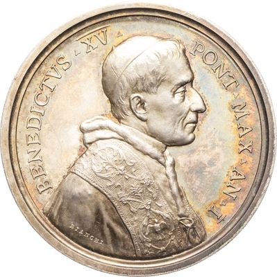 une image représentant une pièce d'argent sur laquelle figure le portrait d'un homme